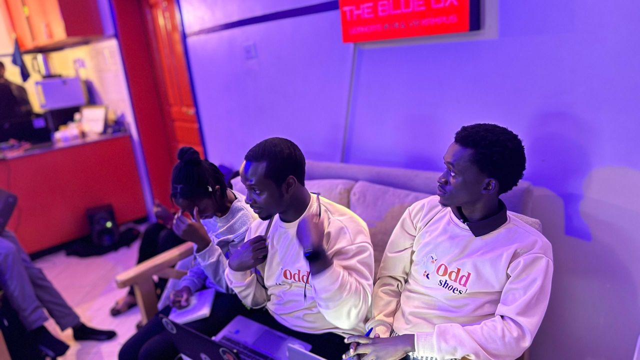 Mubiru Elton Felix serving as a judge at the BlueOx Vibe Coding Competition